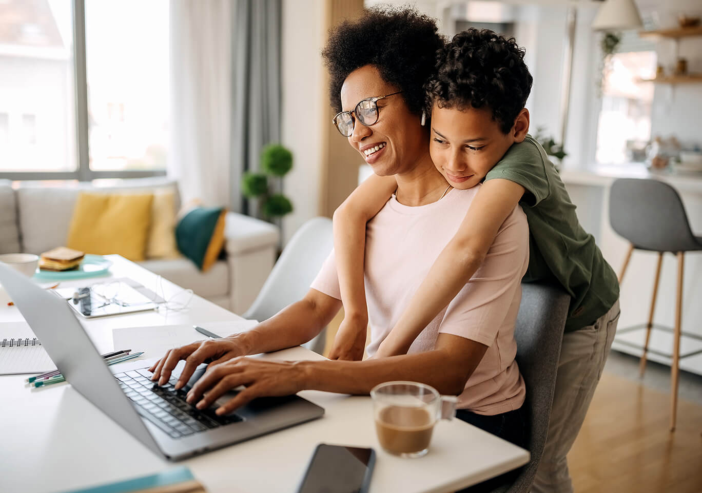 Mom and son using a laptop